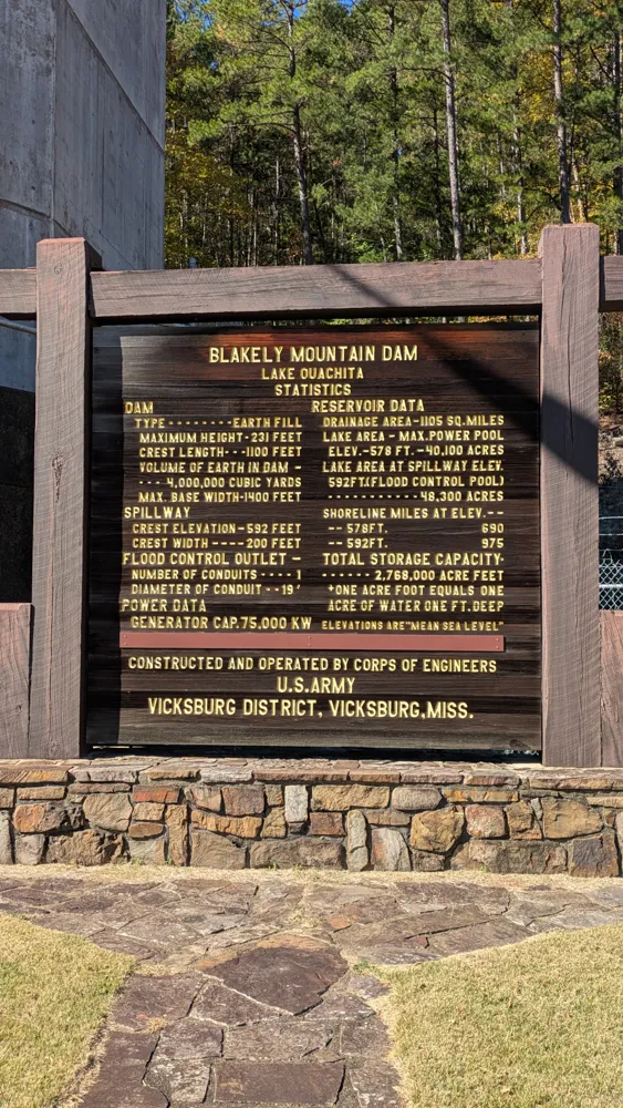 A big board of statistics about the Blakely Dam, just outside of Mountain Pine